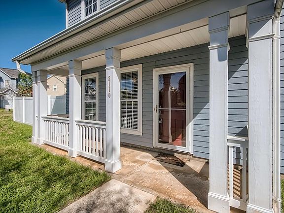 Covered, rocking chair front entry