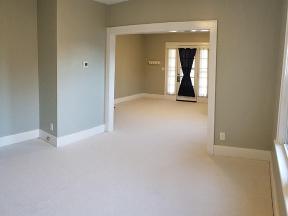 Looking from dining room into living room