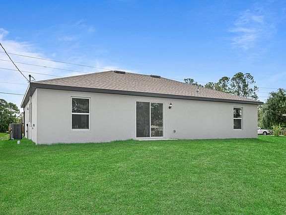 Enjoy a sliding glass door that opens the family room up to the backyard