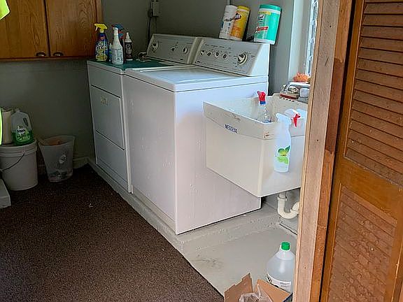 Laundry room off garage.