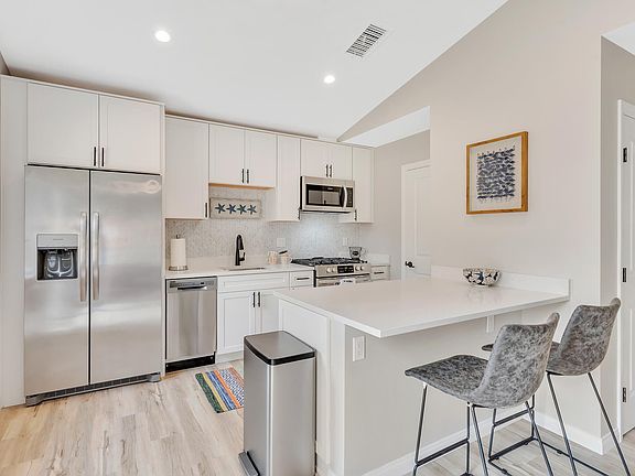 Kitchen with gas stove and new appliances
