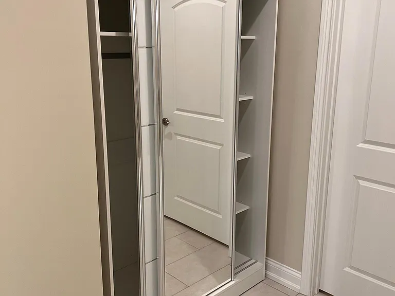 Guest coat closet and shelving
