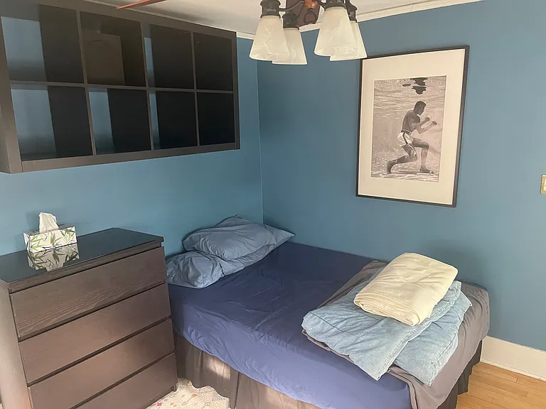 2nd floor - south west bedroom; with storage and glass-top dresser