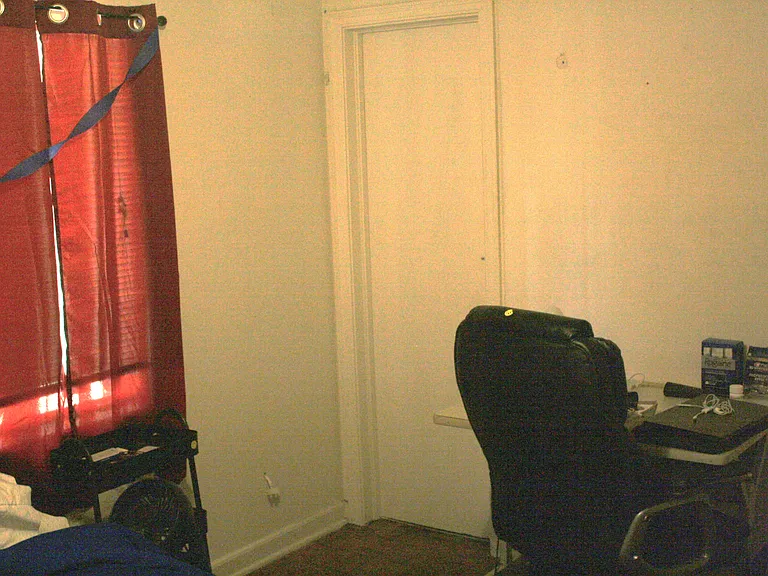 Desk area of bedroom 3 and door to the Jack and Jill bathroom.