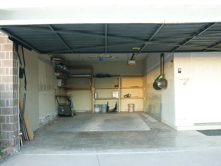 Garage fits one car and tons of storage too, recently converted to new door and opener, see other photos