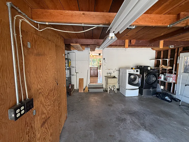 garage with included washer and dryer Lots of space for storage