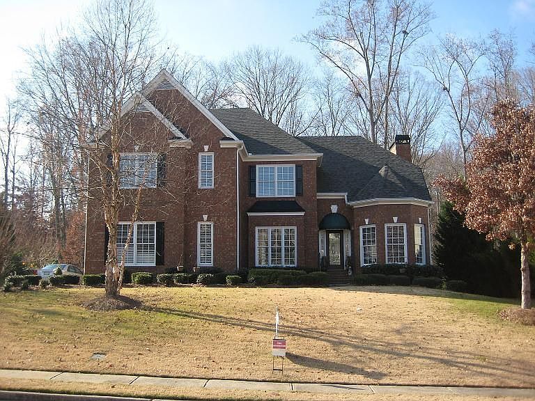 Enjoy a picturesque view of your private backyard.