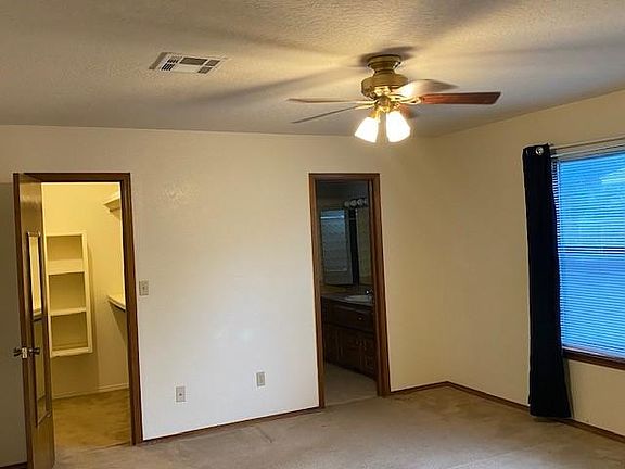 Master bedroom with large walk in closet and bathroom with new shower
