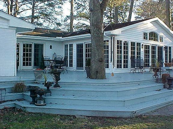 Deck wraps around entire back of house