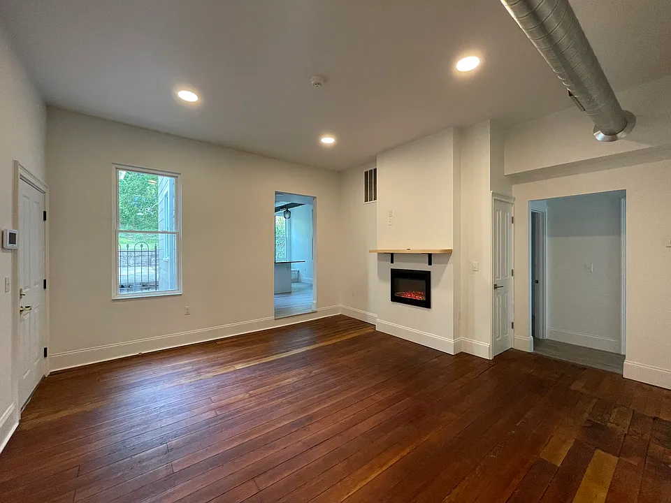 Living Room (16x16) with electric fireplace.