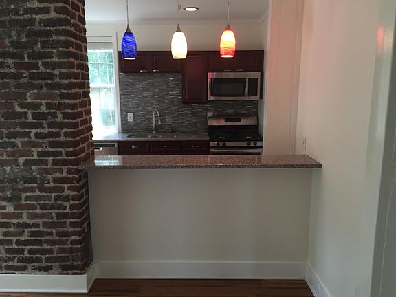 Kitchen and bar seating area