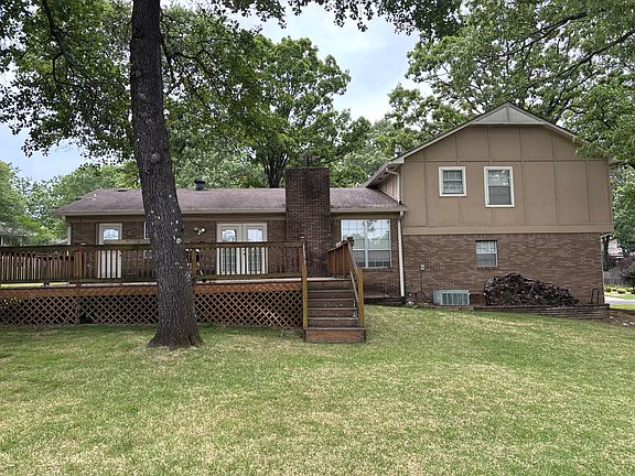 rear of home with large deck