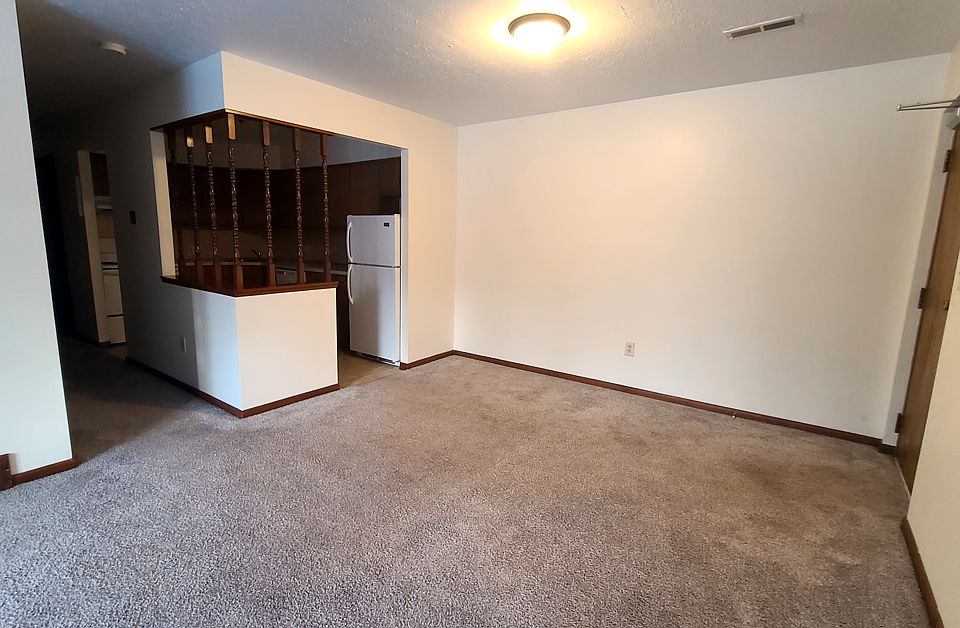 Main living space and view of kitchen