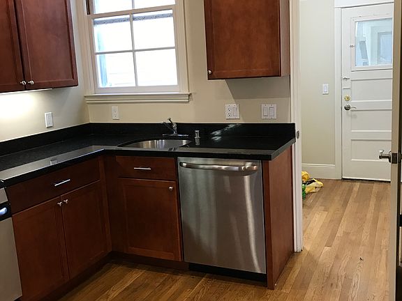 Kitchen with separate laundry room.