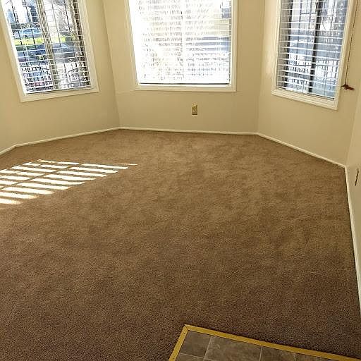 A large living room with high ceiling