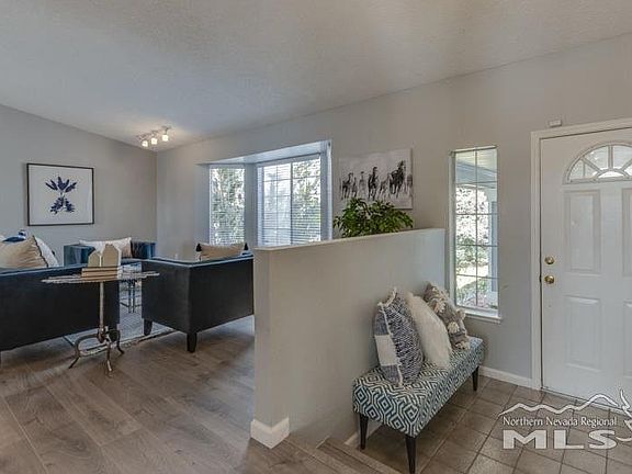 Entry looking into the living room (previous staging)