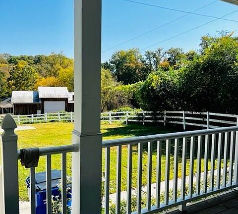 large front yard. Could fence it if needed. Wrap around porch-