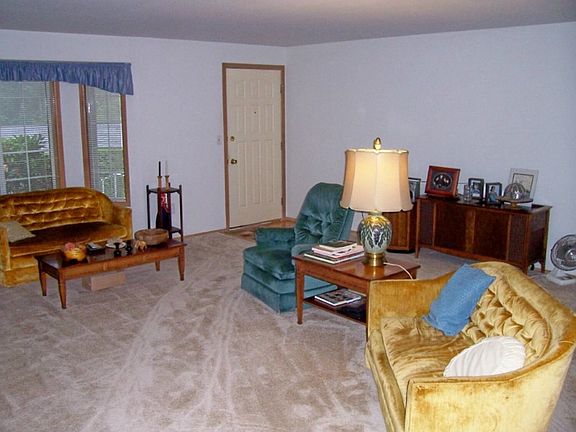 Living room as seen from the kitchen and dining areas; that creates an open feeling and great room setting.