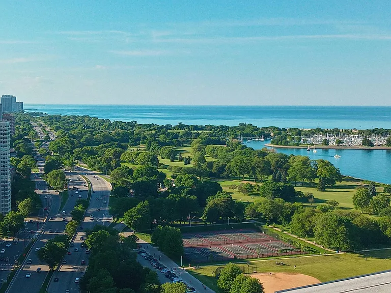 North view from the rooftop includes: Montrose Harbor, Lakeshore Drive, tennis courts, baseball diamonds and the 9 hole Golf Course across the street