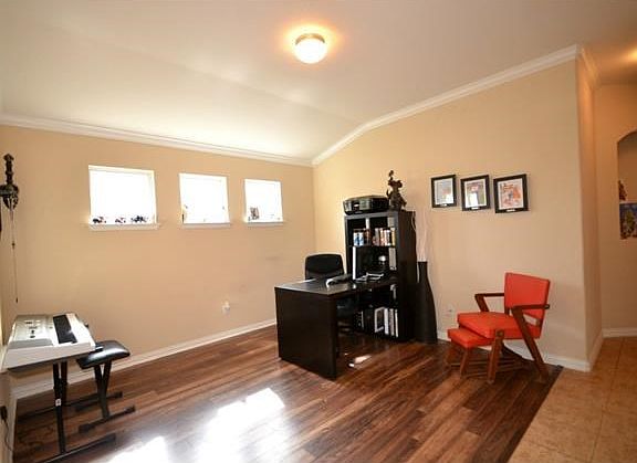 The dining room can easily accommodate a table for eight.