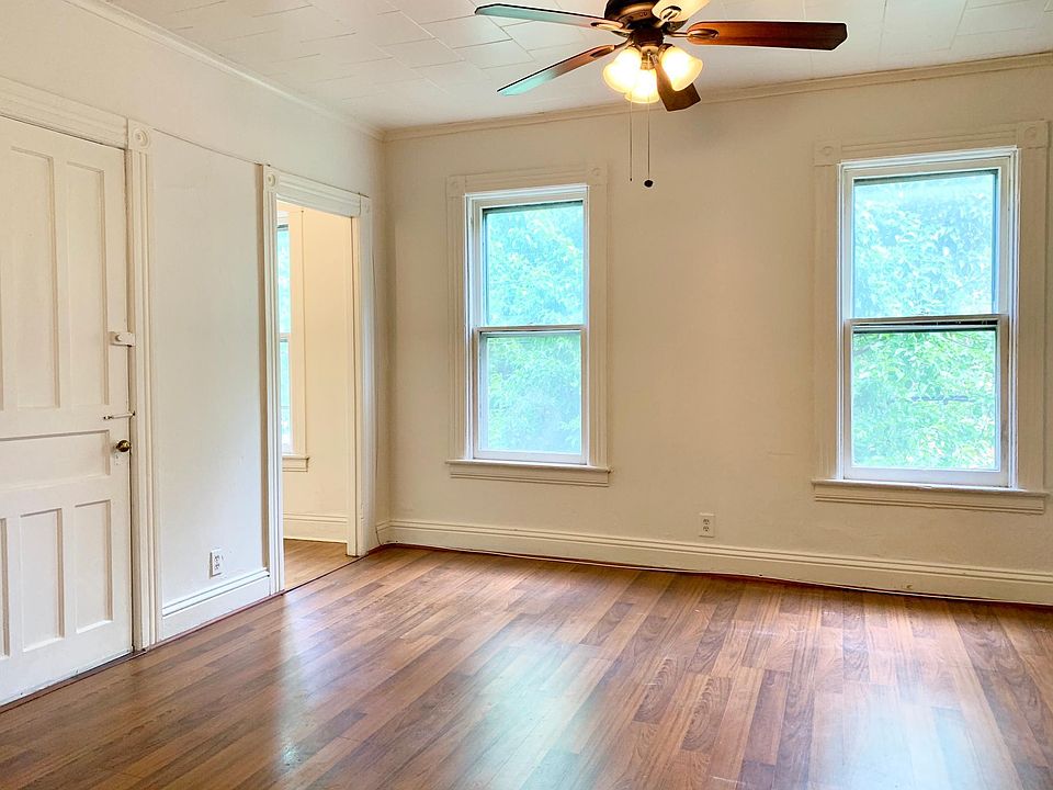 Large living room with additional room for a home office.