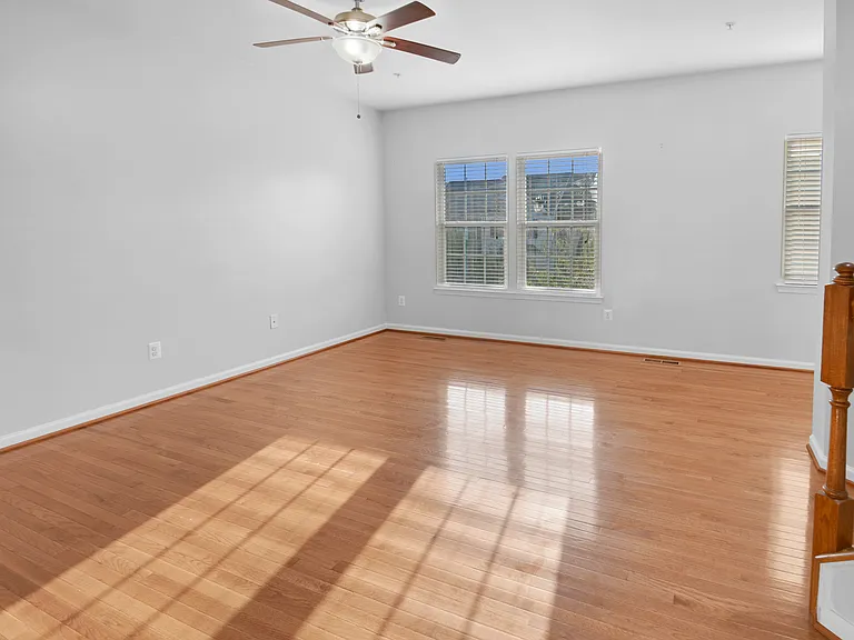 Spacious Family Room with Ceiling Fan
