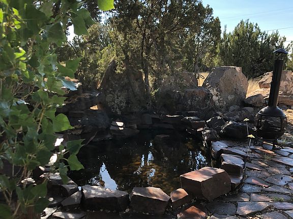 Pond, trees, sitting area