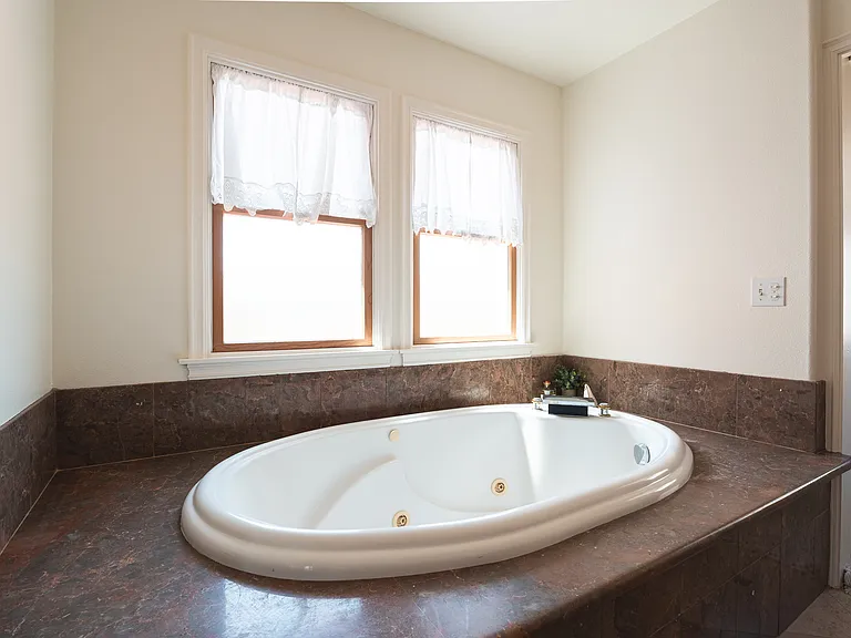 Jacuzzi bath in the master bathroom