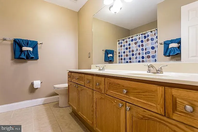 Upstairs Bathroom #2 has been painted since this photo was taken.
