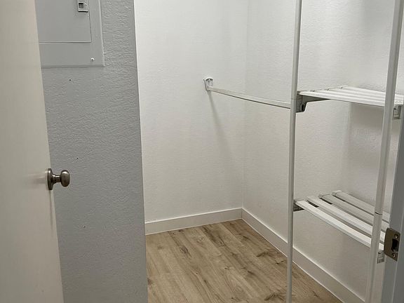 Walk-in closet -- Master bedroom with walk-in closet and ensuite bathroom