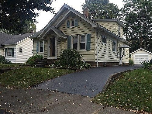 Front of house with driveway