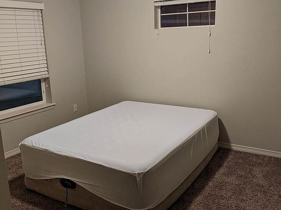 Bedroom for rent. Queen sized air mattress is shown for scale