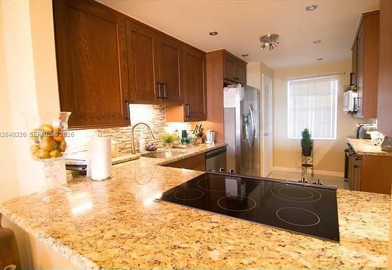 4030 W Palm Aire Dr #505 — Photo 1