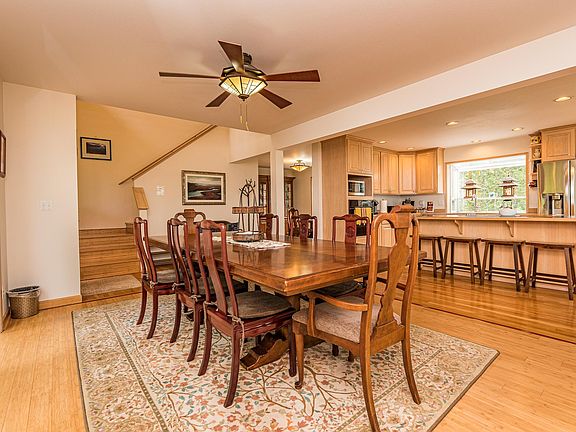 Dining area, slider leading to deck on the left.
