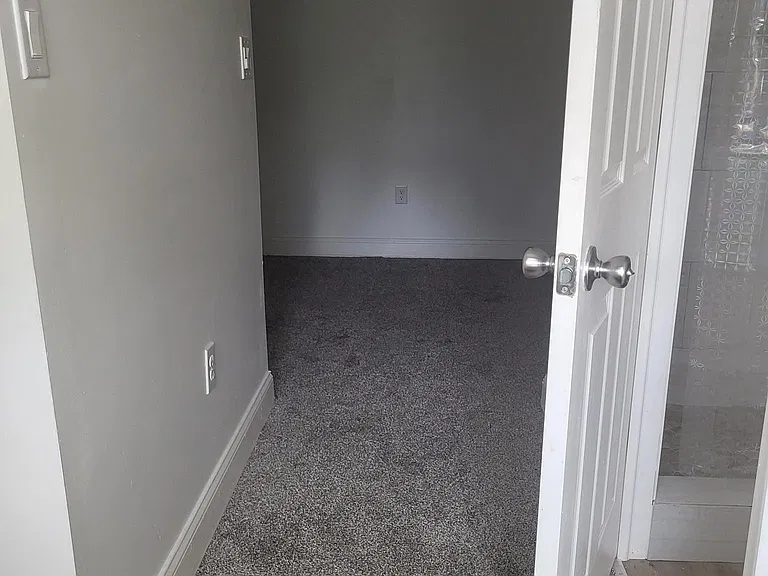 hallway leading to bedroom