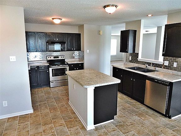 4th image of 5622 Woodland Trace Blvd