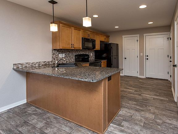 Kitchen with eat in bar