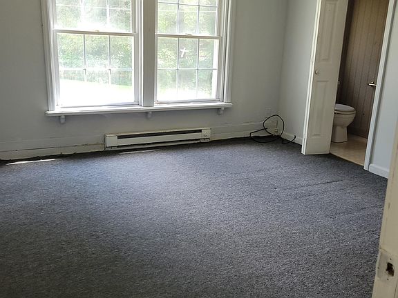 Bedroom with half bath