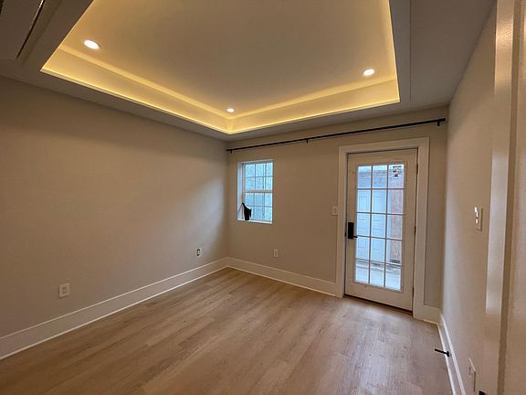Bedroom 1, with private access to back patio.