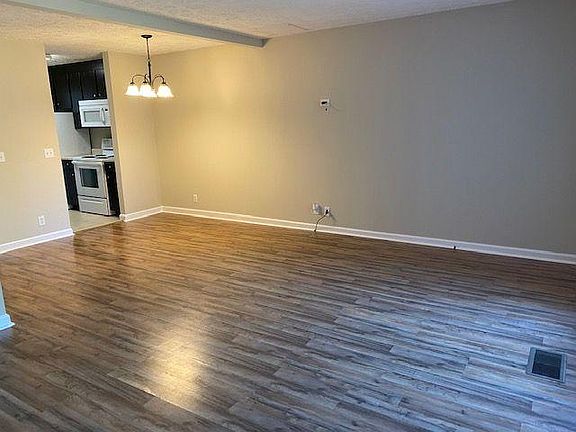 Open living and dining room combination.