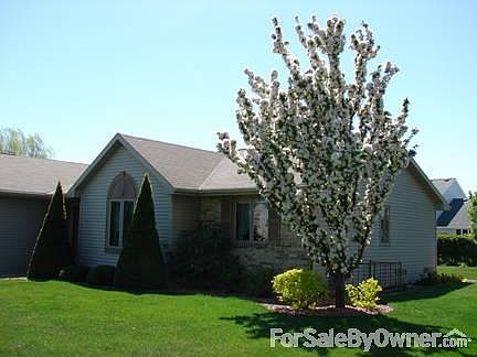 Right side of Home
						:
						White flowering crab apple tree & shrubs