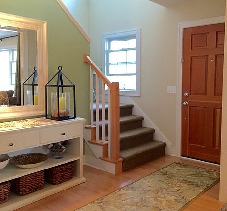 Entry with staircase leading to the 2nd floor