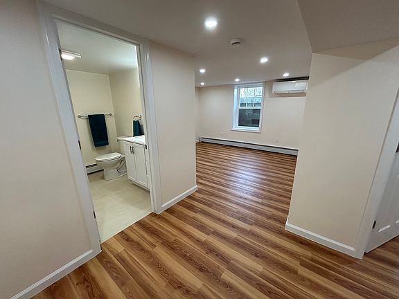 Hallway to bathroom and living room
