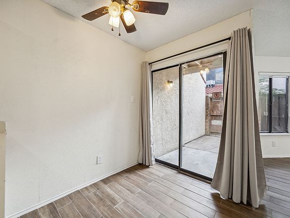 Breakfast nook with ceiling fan. Tile flooring. Overlooking private patio.