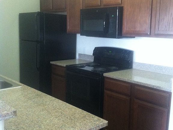 Granite counters and black appliances