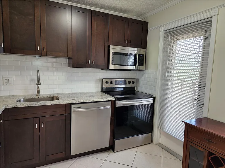 4700 Washington St #308 — Photo 7