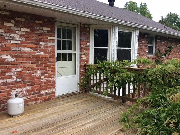 The back deck is high above the yard and has privacy wall.
