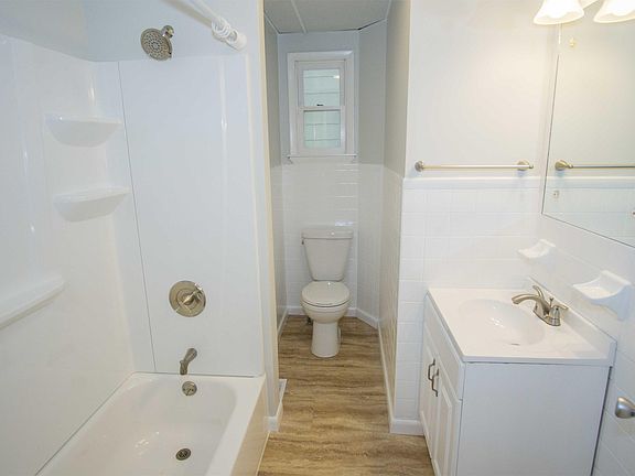All new bath tub, surround, and fixtures.