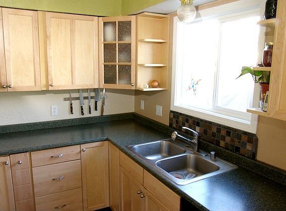 Updated kitchen with 5 burner double oven gas range & stainless frig