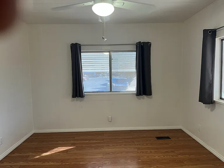 3rd bedroom or great for an office. Also has a ceiling fan with overhead lighting.